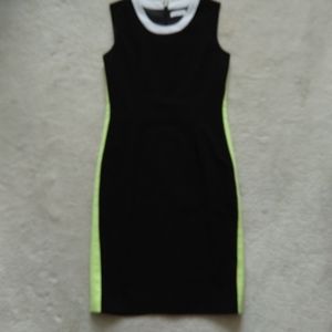 Calvin Klein neon green and black bodycon dress.